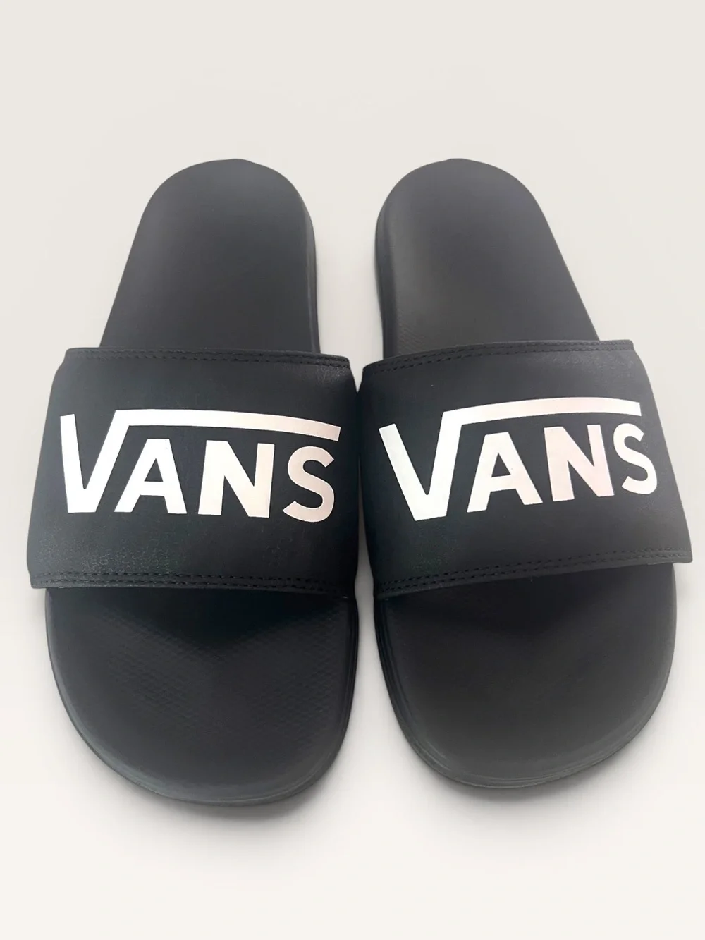 Vans La Costa Black Slides with White Vans Logo